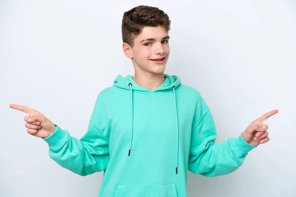 Teenager Ruský Muž Izolovaný Bílém Pozadí Ukazující Prstem Laterály Šťastný — Stock fotografie