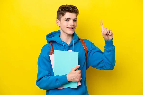 Adolescente Russo Estudante Homem Isolado Fundo Amarelo Apontando Para Uma — Fotografia de Stock