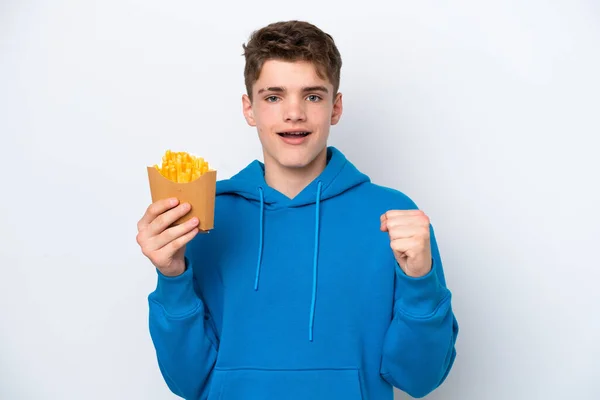 Teenager Russian Man Holding Fried Potatoes Isolated White Background Celebrating — Stock Photo, Image