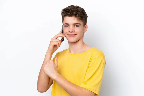 Подросток Человек Помощью Мобильного Телефона Изолированы Белом Фоне Гордый Самодовольный — стоковое фото