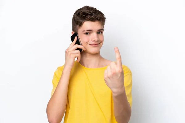 Teenager Muž Pomocí Mobilního Telefonu Izolované Bílém Pozadí Dělá Nadcházející — Stock fotografie