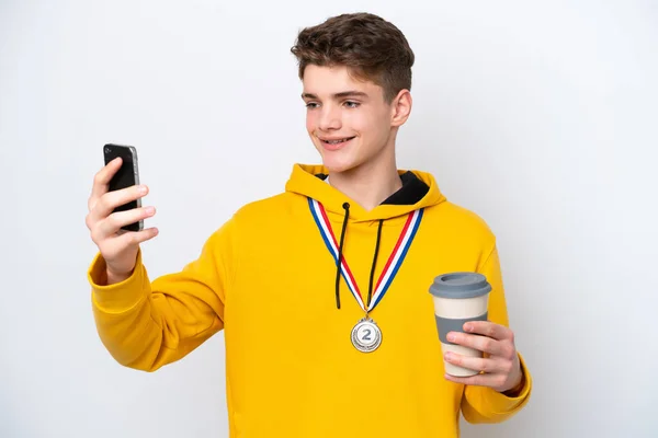 Teenager Russian Man Medals Isolated White Background Holding Coffee Take — Stock Photo, Image