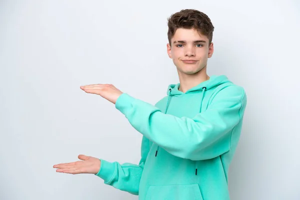 Teenager Ruský Člověk Izolované Bílém Pozadí Držení Copyspace Vložit Inzerát — Stock fotografie