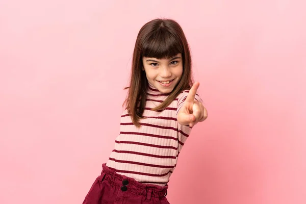 Little Girl Isolated Pink Background Showing Lifting Finger — Stockfoto