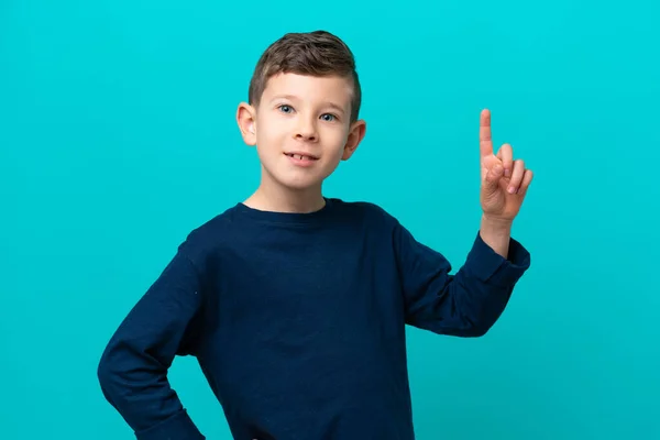 Niño Pequeño Aislado Sobre Fondo Azul Mostrando Levantando Dedo Señal —  Fotos de Stock