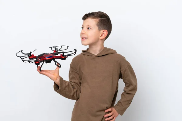 Little Caucasian Boy Holding Drone Isolated White Background Looking Side — Stock Photo, Image