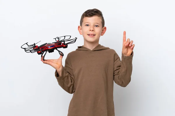 Little Caucasian Boy Holding Drone Isolated White Background Pointing Great — Stock Photo, Image