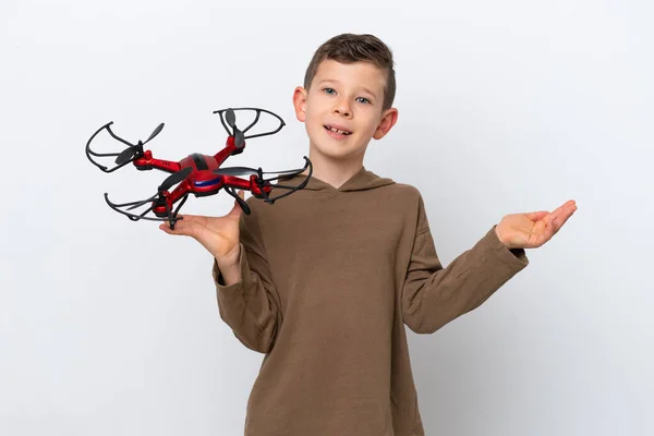 Little Caucasian Boy Holding Drone Isolated White Background Extending Hands — Stock Photo, Image