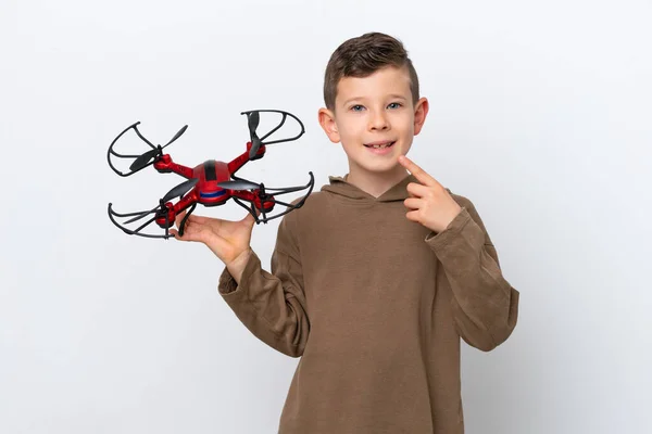 Little Caucasian Boy Holding Drone Isolated White Background Giving Thumbs — Stock Photo, Image