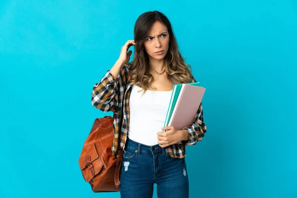 Jonge Student Vrouw Geïsoleerd Blauwe Achtergrond Gefrustreerd Het Bedekken Van — Stockfoto