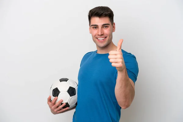 Jovem Caucasiano Isolado Fundo Branco Com Bola Futebol Com Polegar — Fotografia de Stock