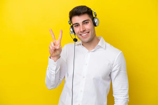 Telemarketer Caucasian Man Working Headset Isolated Yellow Background Smiling Showing — Stock Photo, Image