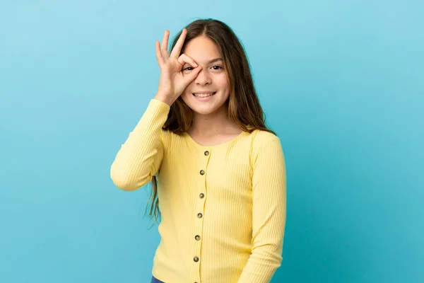 Little Caucasian Girl Isolated Blue Background Showing Sign Fingers — Stock Photo, Image