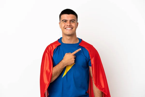 製品を提示するために側面を指して隔離された白い背景の上にスーパーヒーロー — ストック写真
