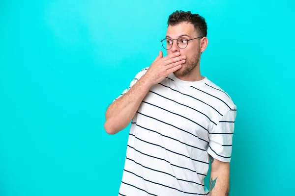 Young Brazilian Man Isolated Blue Background Doing Surprise Gesture While — Stock Photo, Image