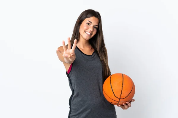 年轻的巴西女子在白色背景下打篮球 快乐极了 她用手指数着四个人 — 图库照片