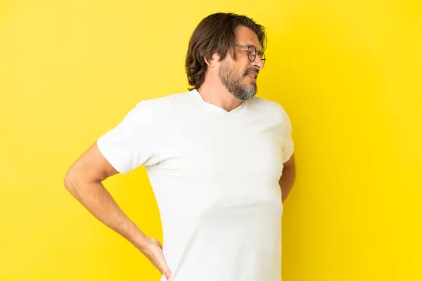 Senior Dutch Man Isolated Yellow Background Suffering Backache Having Made — Stock Photo, Image