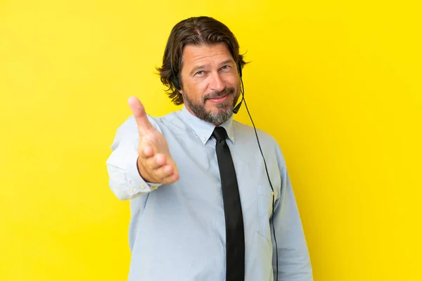Telemarketer Dutch Man Working Headset Isolated Yellow Background Shaking Hands — Stock Photo, Image