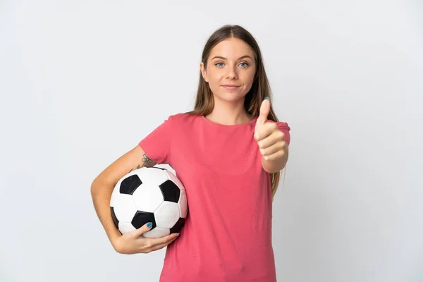 年轻的立陶宛女子 背靠白色背景 带着足球和大拇指被隔离 — 图库照片