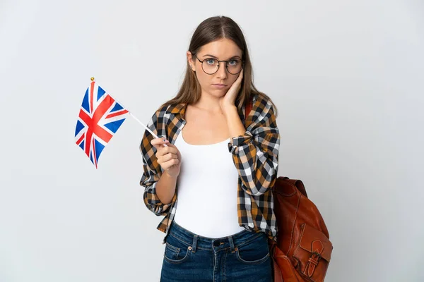 Mladá Litevka Drží Vlajku Spojeného Království Izolované Bílém Pozadí Frustrovaný — Stock fotografie