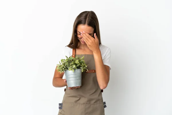 피곤하고 표정으로 식물을 가르덴 — 스톡 사진