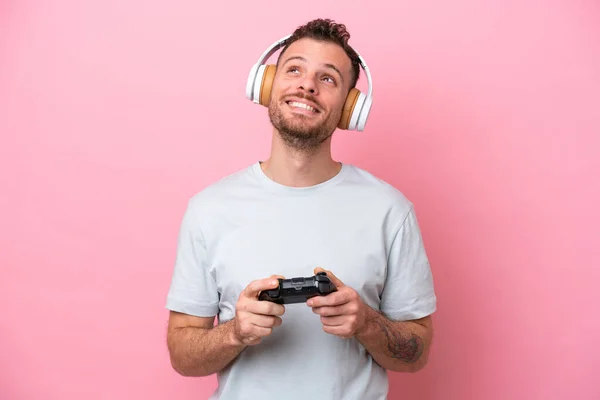Young Brazilian Man Playing Video Game Controller Isolated Pink Background — Stock Photo, Image