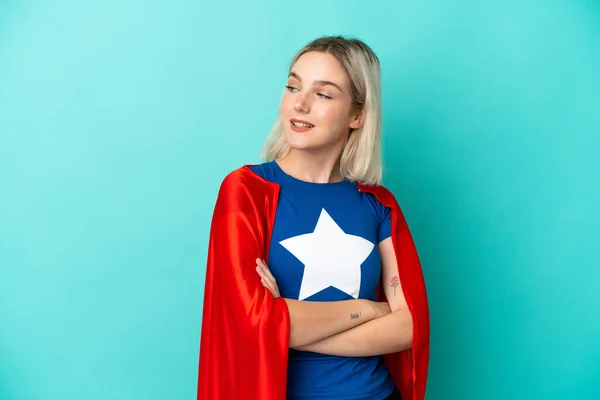 Super Hero Caucasian Woman Isolated Blue Background Arms Crossed Happy — Stock Photo, Image