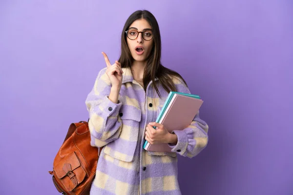 Jovem Estudante Mulher Isolada Fundo Roxo Com Intenção Realizar Solução — Fotografia de Stock