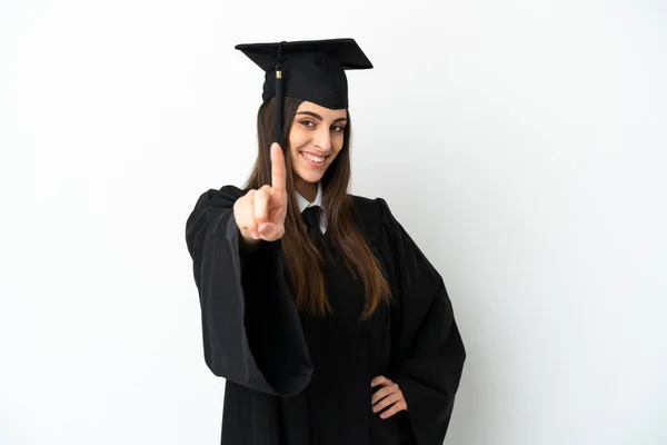 Νεαρός Απόφοιτος Πανεπιστημίου Απομονώνονται Λευκό Φόντο Δείχνει Και Άρει Ένα — Φωτογραφία Αρχείου