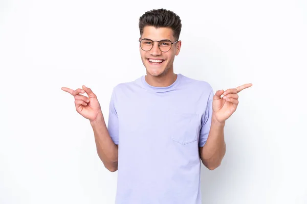 Young Caucasian Man Isolated White Background Pointing Finger Laterals Happy — Stock Photo, Image