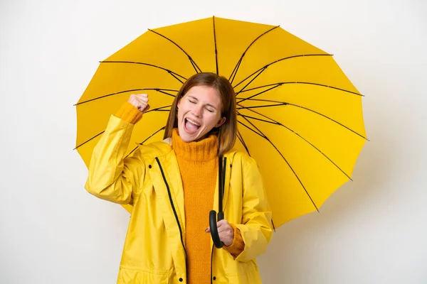 Young English Woman Rainproof Coat Umbrella Isolated White Background Celebrating — Stock Photo, Image