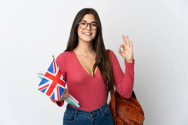 拿着英国国旗的巴西少女 背景为白色 手指头上有可控标志 — 图库照片