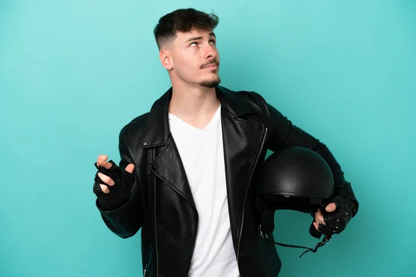 Young Caucasian Man Motorcycle Helmet Isolated Blue Background Fingers Crossing — Stock Photo, Image
