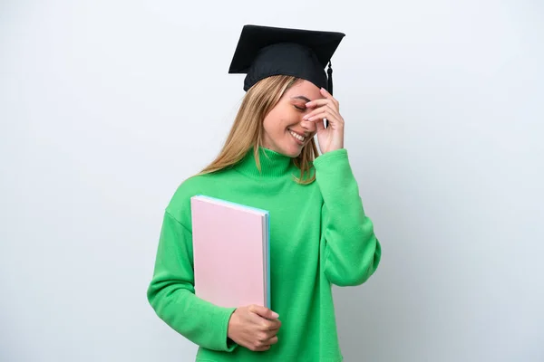 若い大学院生の女性は白地笑いで隔離されました — ストック写真