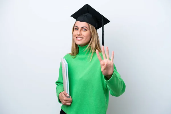 Joven Universitaria Graduada Aislada Sobre Fondo Blanco Feliz Contando Cuatro —  Fotos de Stock