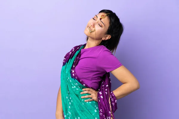 Indian Woman Isolated Purple Background Suffering Backache Having Made Effort — Stock Photo, Image
