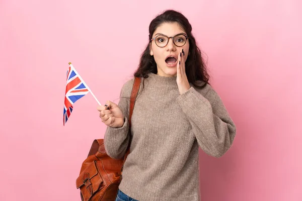 Mujer Rusa Joven Sosteniendo Una Bandera Del Reino Unido Aislada —  Fotos de Stock