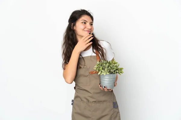 Jong Russisch Tuinman Meisje Houden Een Plant Geïsoleerd Zoek Omhoog — Stockfoto