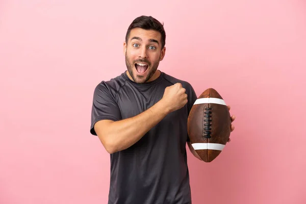 Young Caucasian Man Playing Rugby Isolated Pink Background Celebrating Victory — Stock Photo, Image