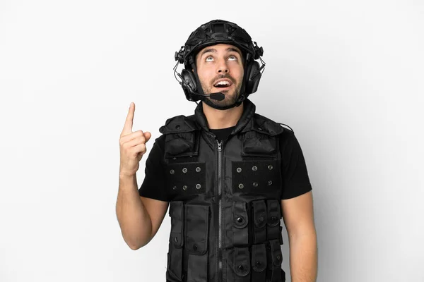 Young Caucasian Swat Isolated White Background Pointing Surprised — Stock Photo, Image