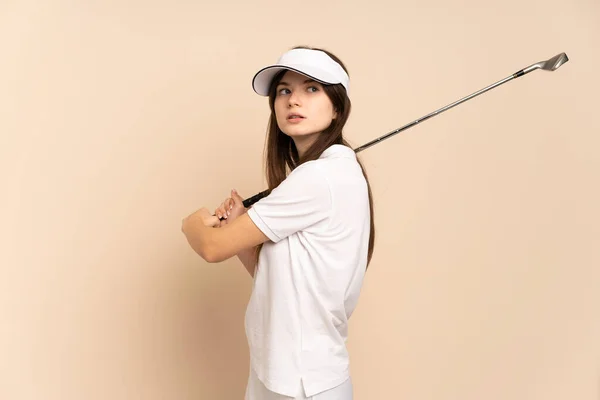 Young Ukrainian Girl Isolated Beige Background Playing Golf — Stock Photo, Image