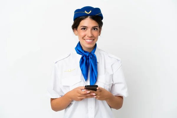 Flygvärdinna Kaukasiska Kvinna Isolerad Vit Bakgrund Skicka Ett Meddelande Med — Stockfoto