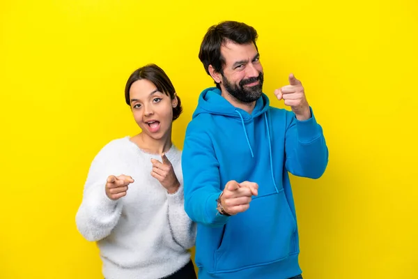Young Caucasian Couple Isolated Yellow Background Points Finger You Confident — 图库照片