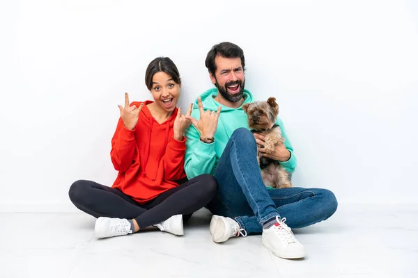 Young Caucasian Couple Sitting Floor Pet Isolated White Background Making — Foto Stock