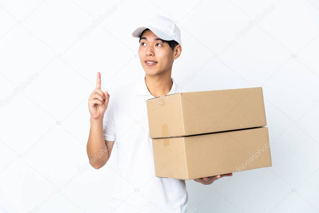 Delivery Chinese man isolated on white background pointing up a great idea