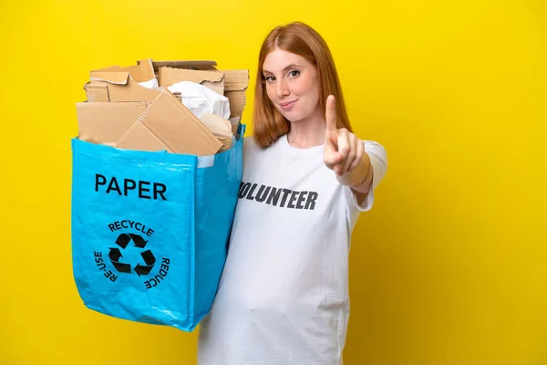 Young Redhead Woman Holding Recycling Bag Full Paper Recycle Isolated — Stock Photo, Image