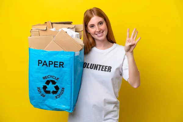 Young Redhead Woman Holding Recycling Bag Full Paper Recycle Isolated — ストック写真