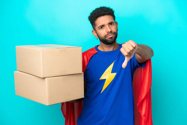 Super Hero Delivery Brazilian Man Isolated Blue Background Showing Thumb — Stock Photo, Image