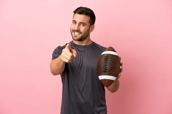 Young Caucasian Man Playing Rugby Isolated Pink Background Pointing Front — Stock Photo, Image