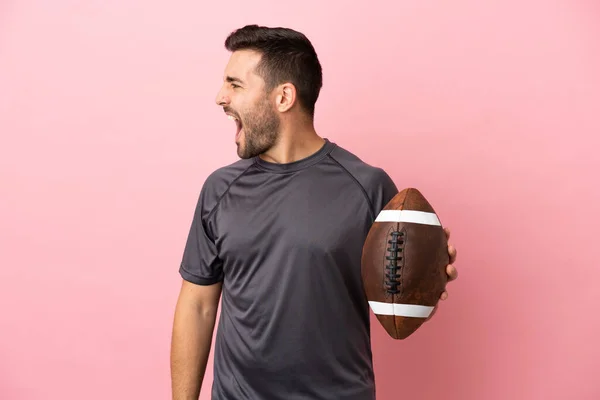 Young Caucasian Man Playing Rugby Isolated Pink Background Laughing Lateral — Stock Photo, Image